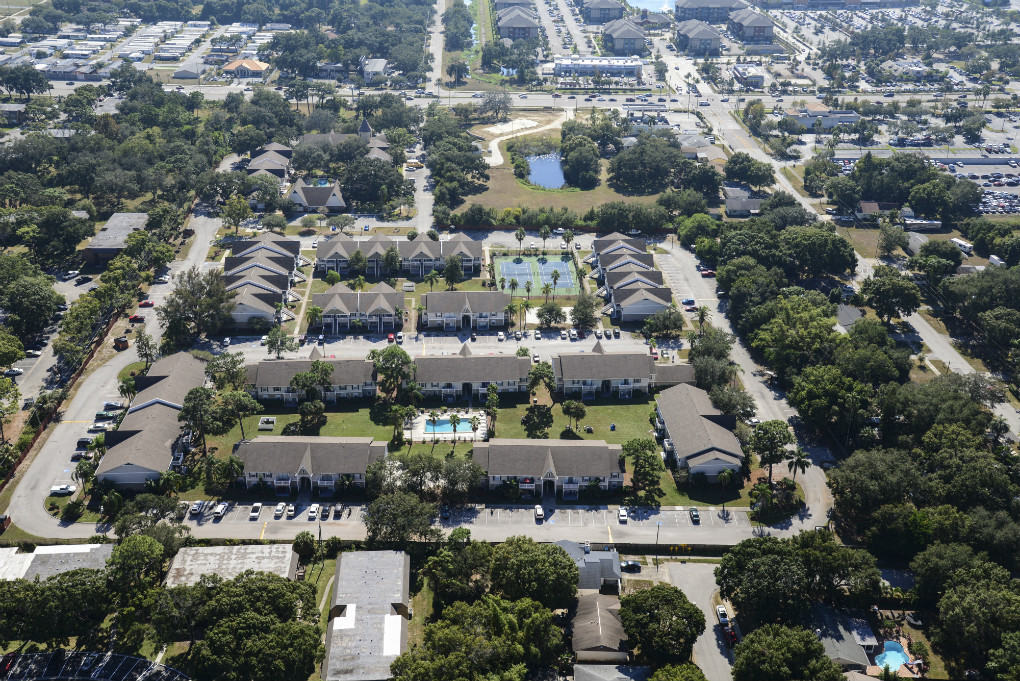 This aerial shot shows our gated community with pools and tennis courts.