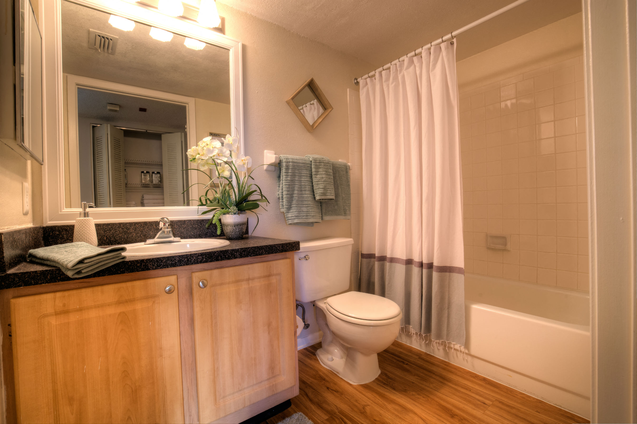 Upgraded bathrooms feature designer touches.