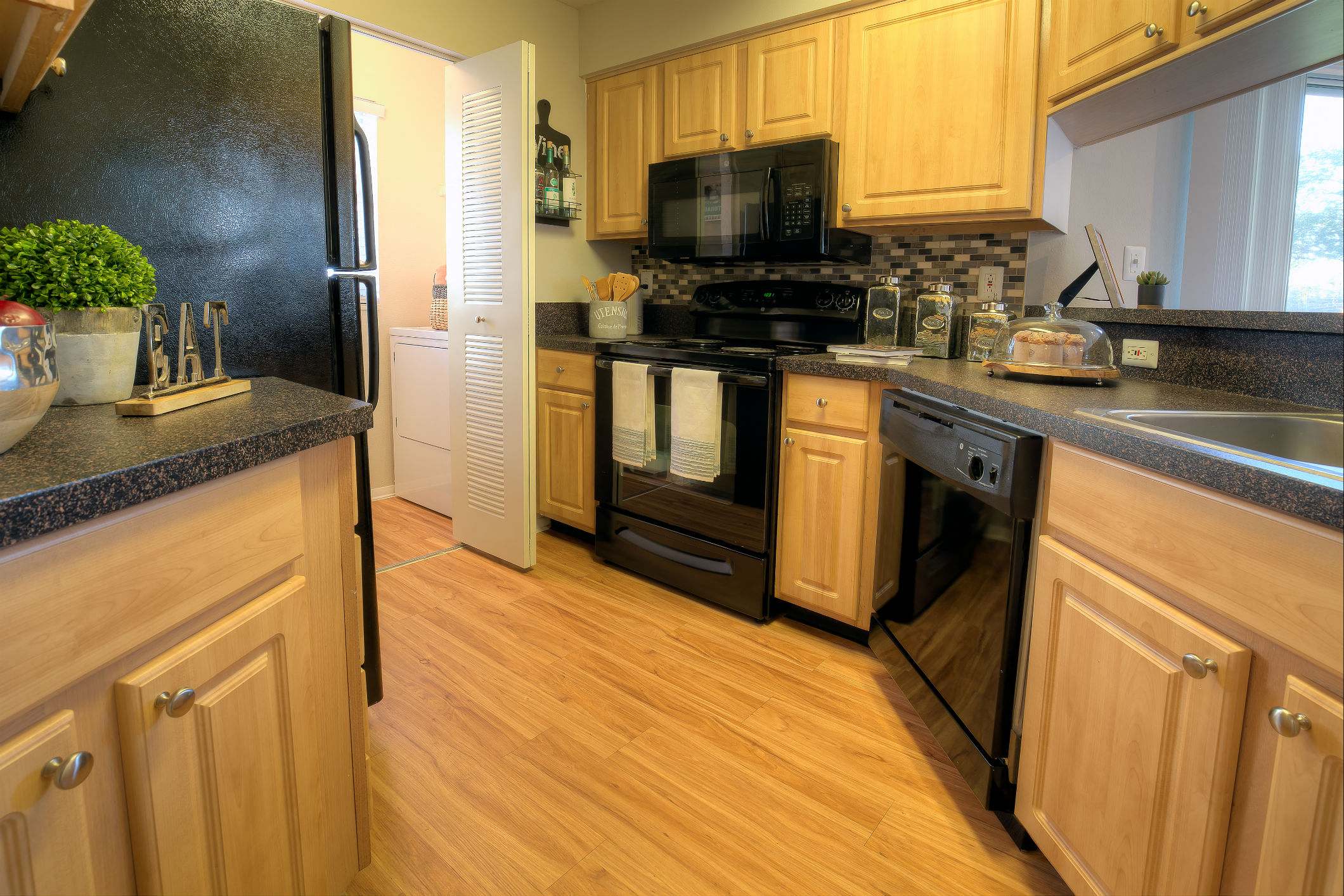 Spacious kitchens include a pantry and plenty of above and below cabinet storage.