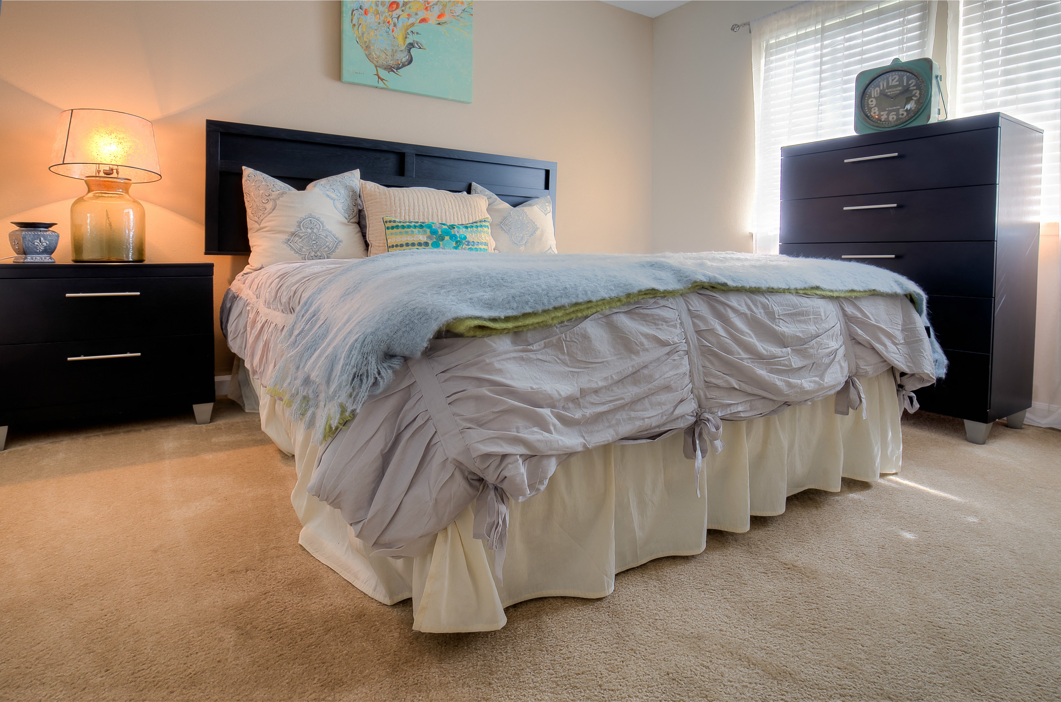 Spacious bedrooms feature wall-to-wall carpet.