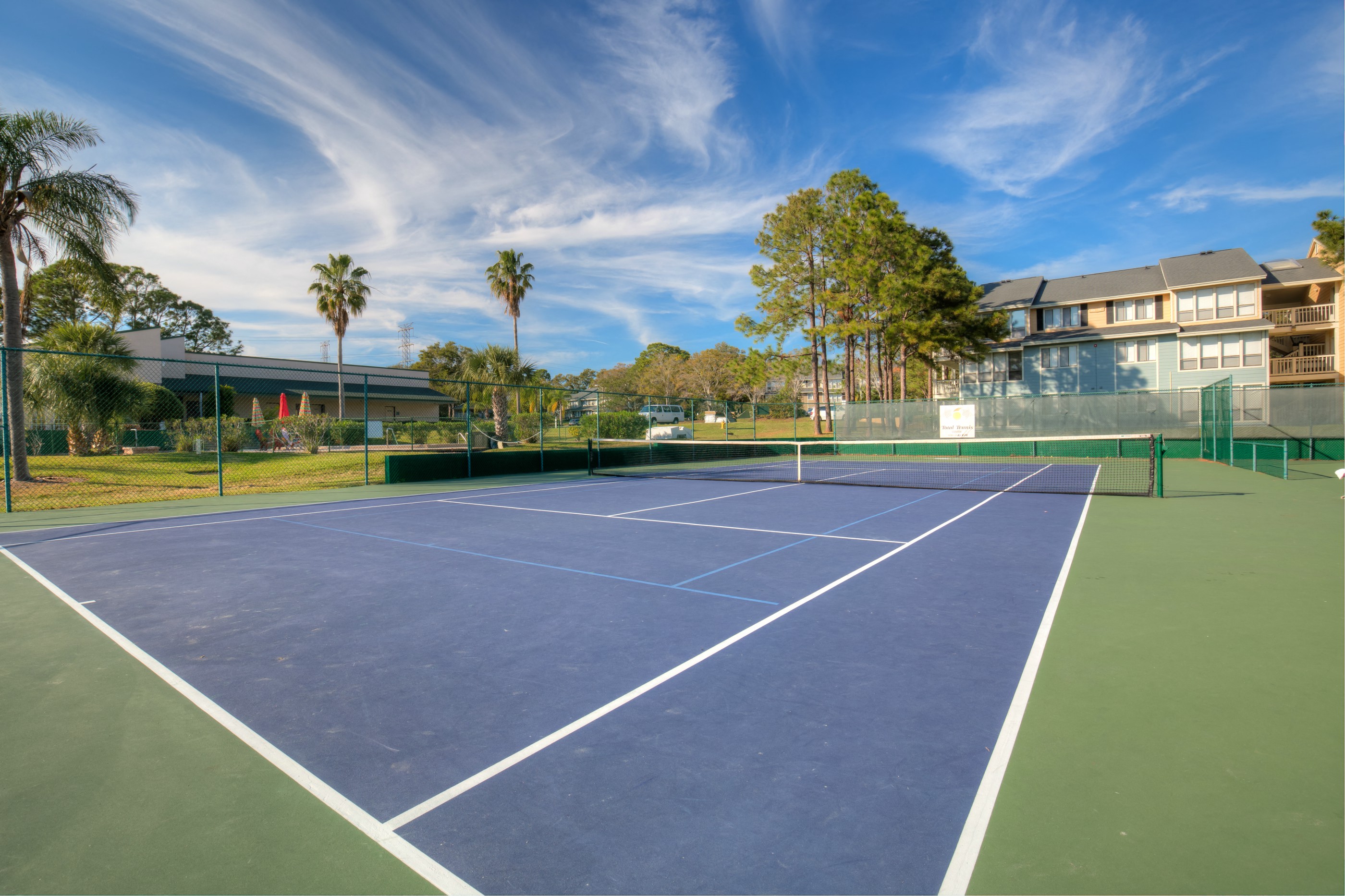The tennis court offers a sweet spot for a game.