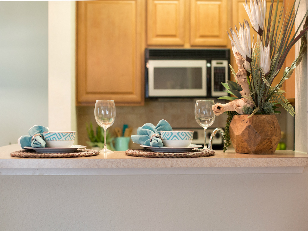 The breakfast bar is the perfect spot for morning coffee or casual dinner.