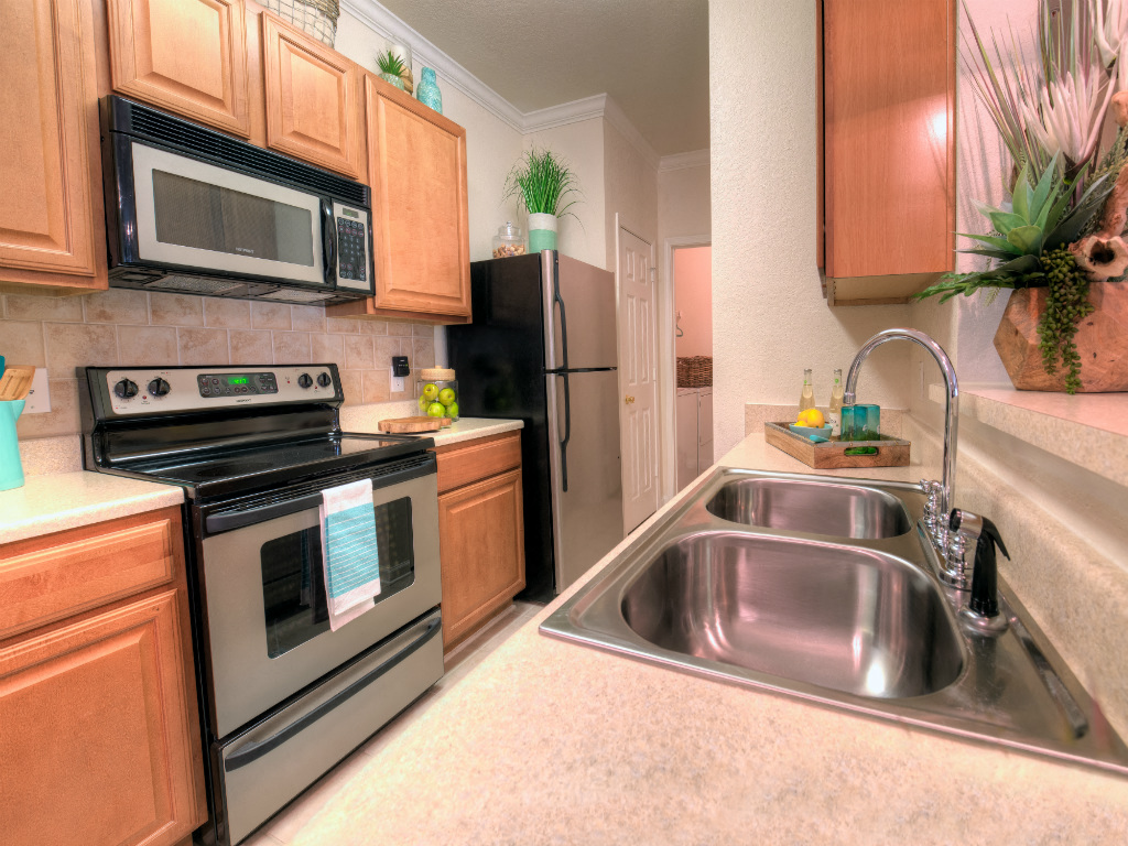 Spacious kitchens include plenty of above and below cabinet storage in addition to a complete appliance package.