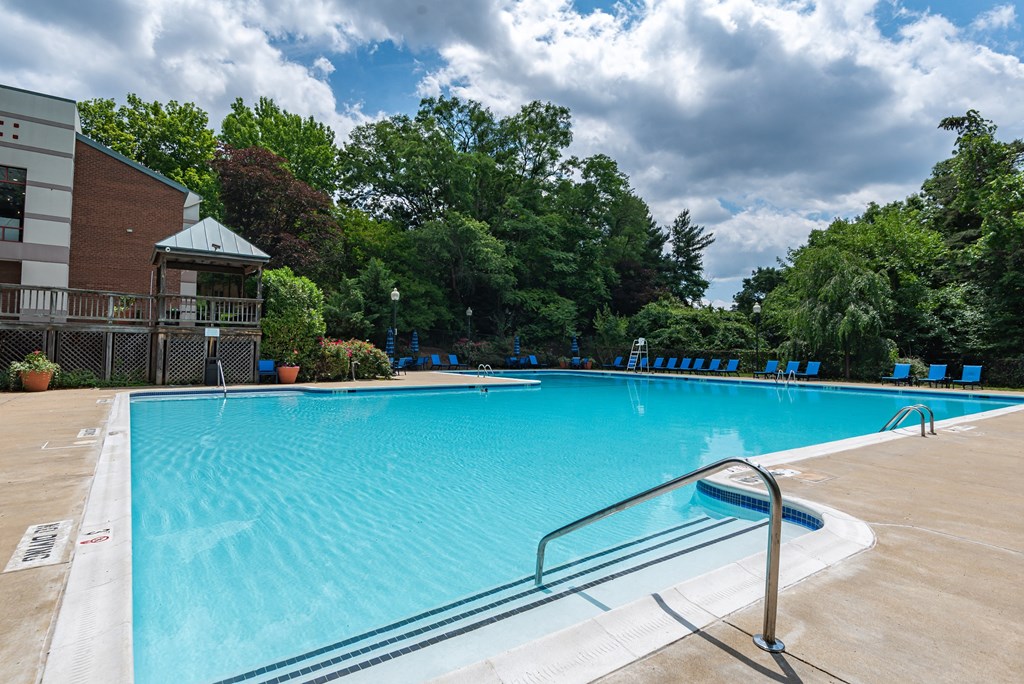the swimming pool at the crossings at providence apartment community