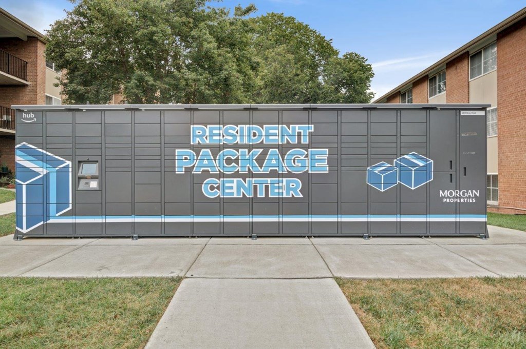 a sign on the side of a building that readsresident package center