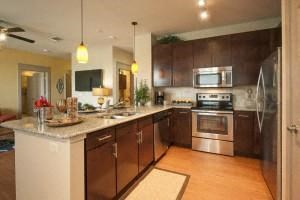 a large kitchen with a counter top