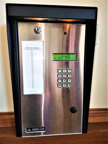 a stainless steel refrigerator with a label on it