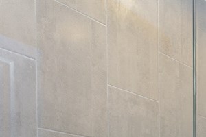 a bathroom with a shower toilet and a sink