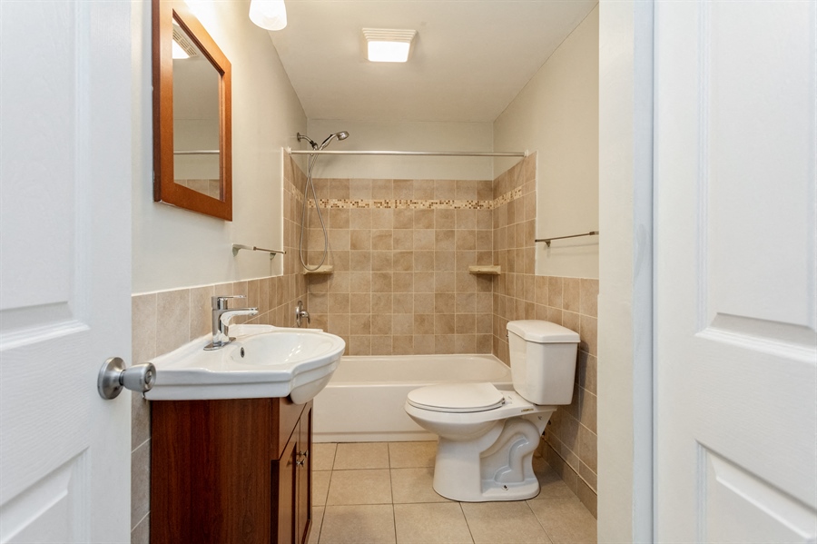 a bathroom with a toilet and a sink