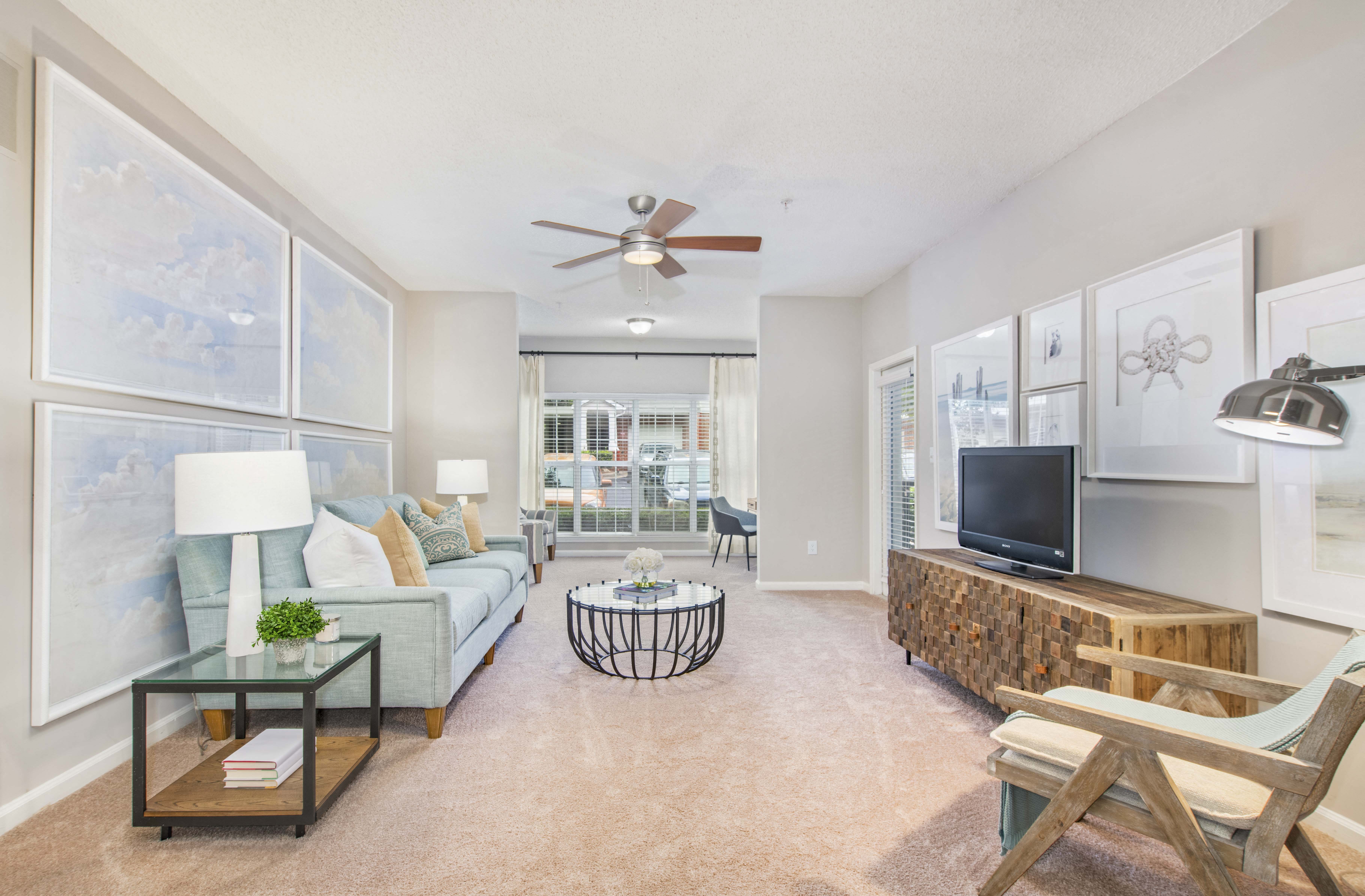 a living room with a couch and a tv