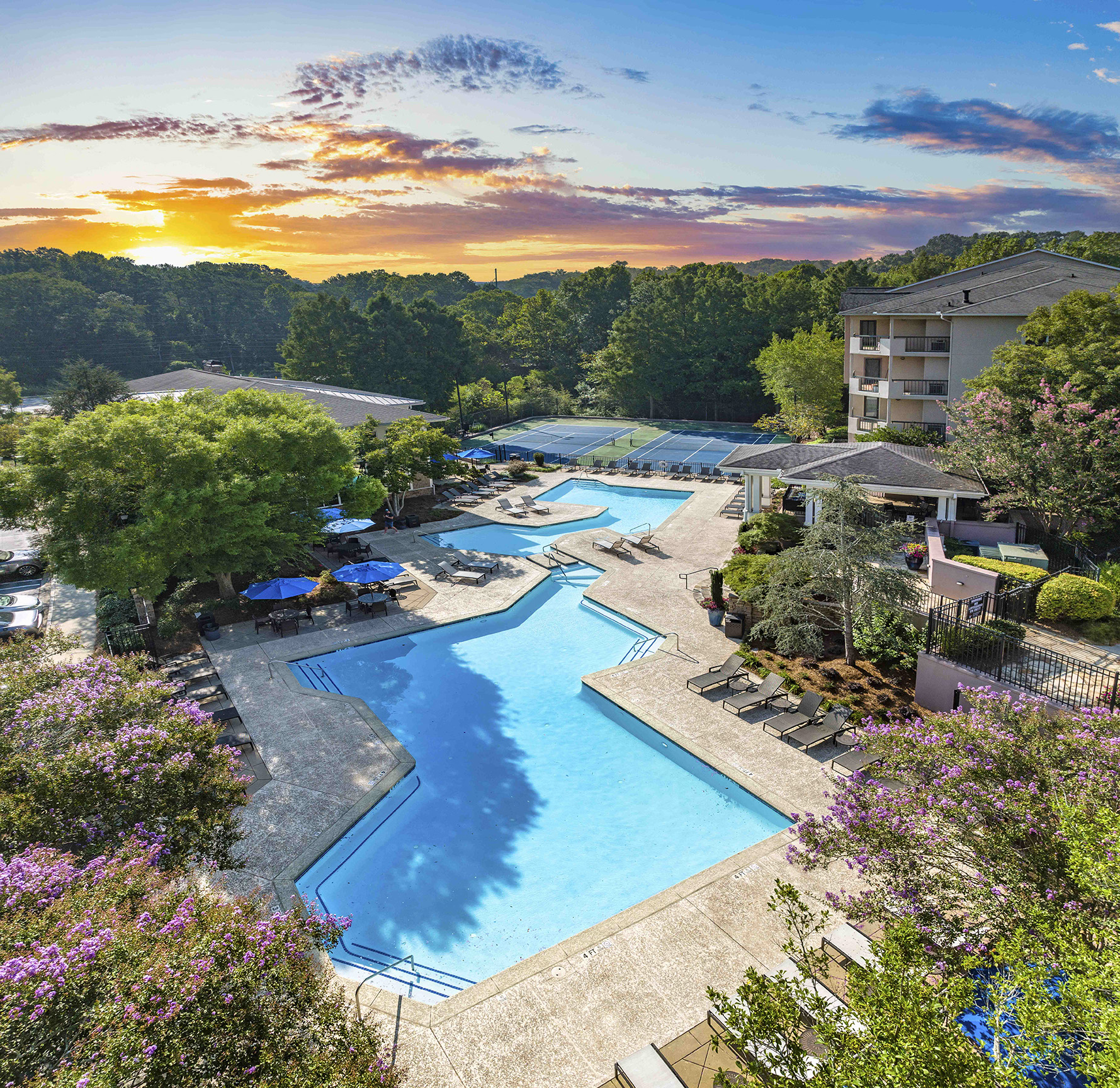 an aerial view of the pool at the resort at auburn
