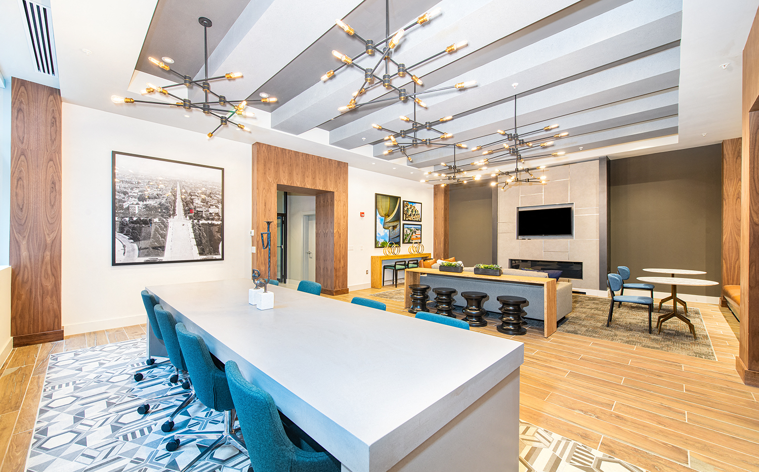a conference room with a long white table and chairs