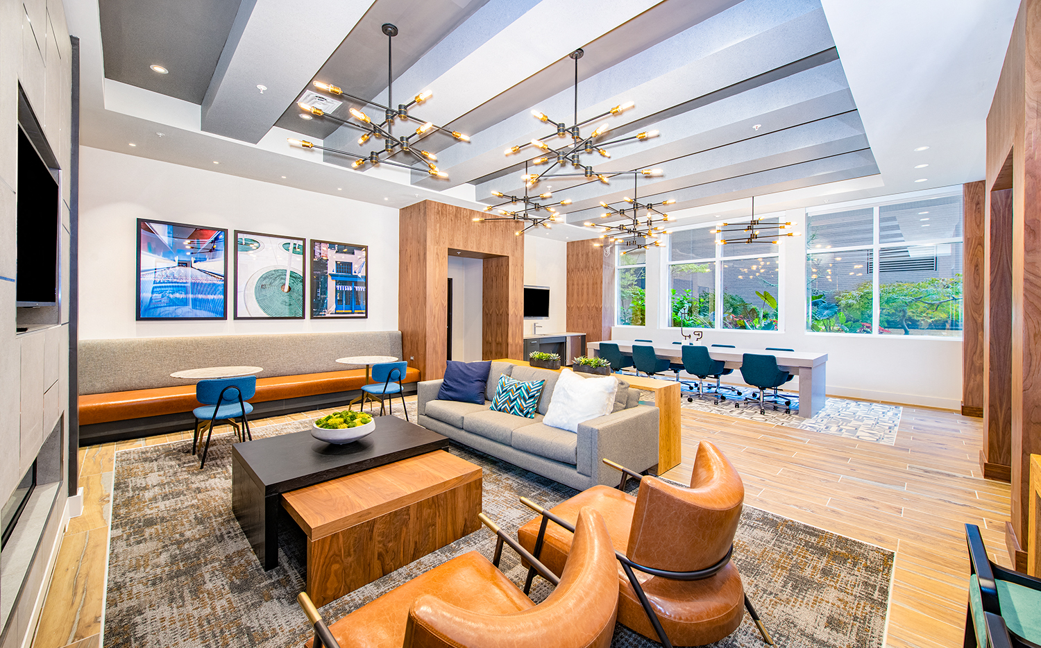 a living room with couches and chairs and a table