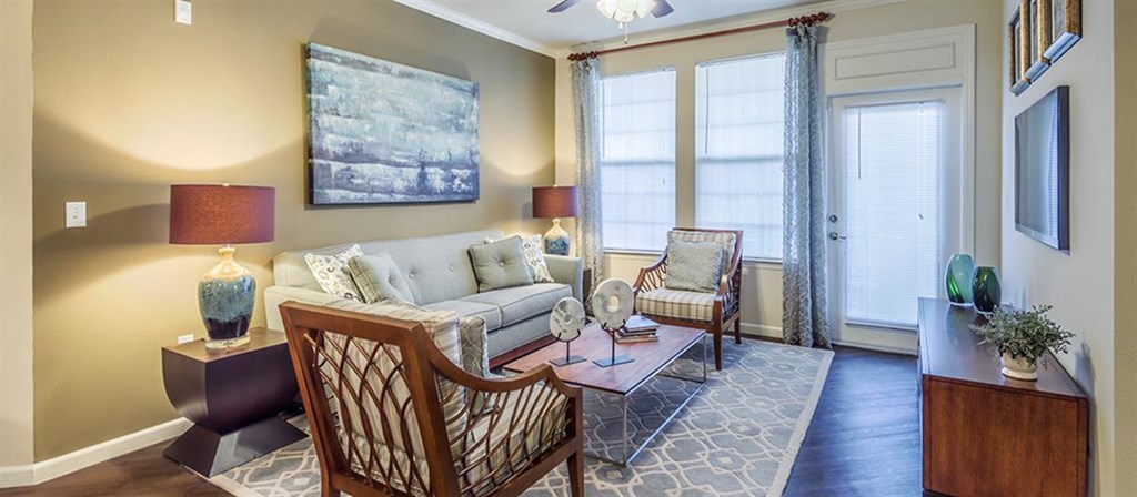 a living room with a couch and a table