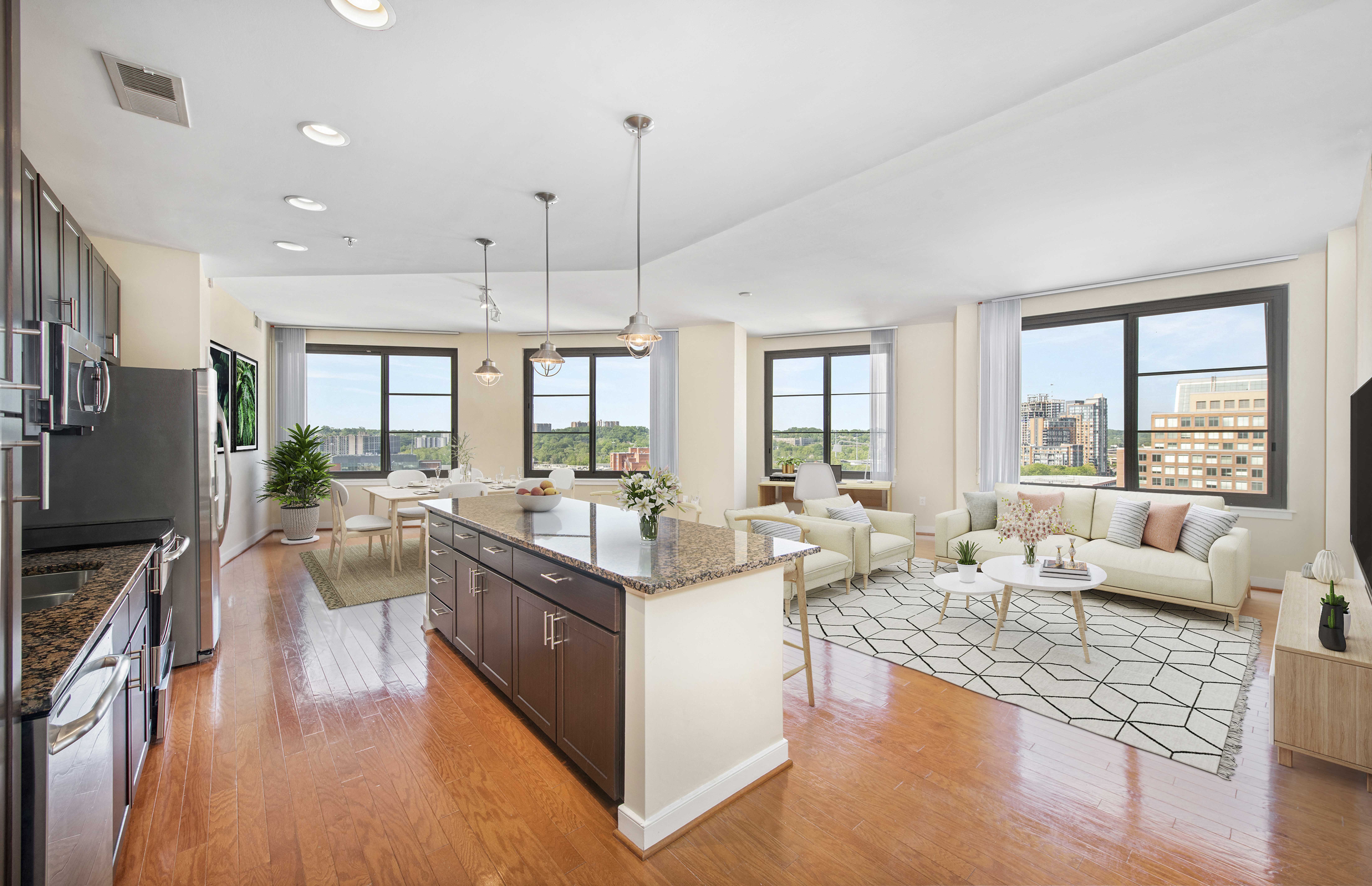 an open floorplan with a kitchen and living room
