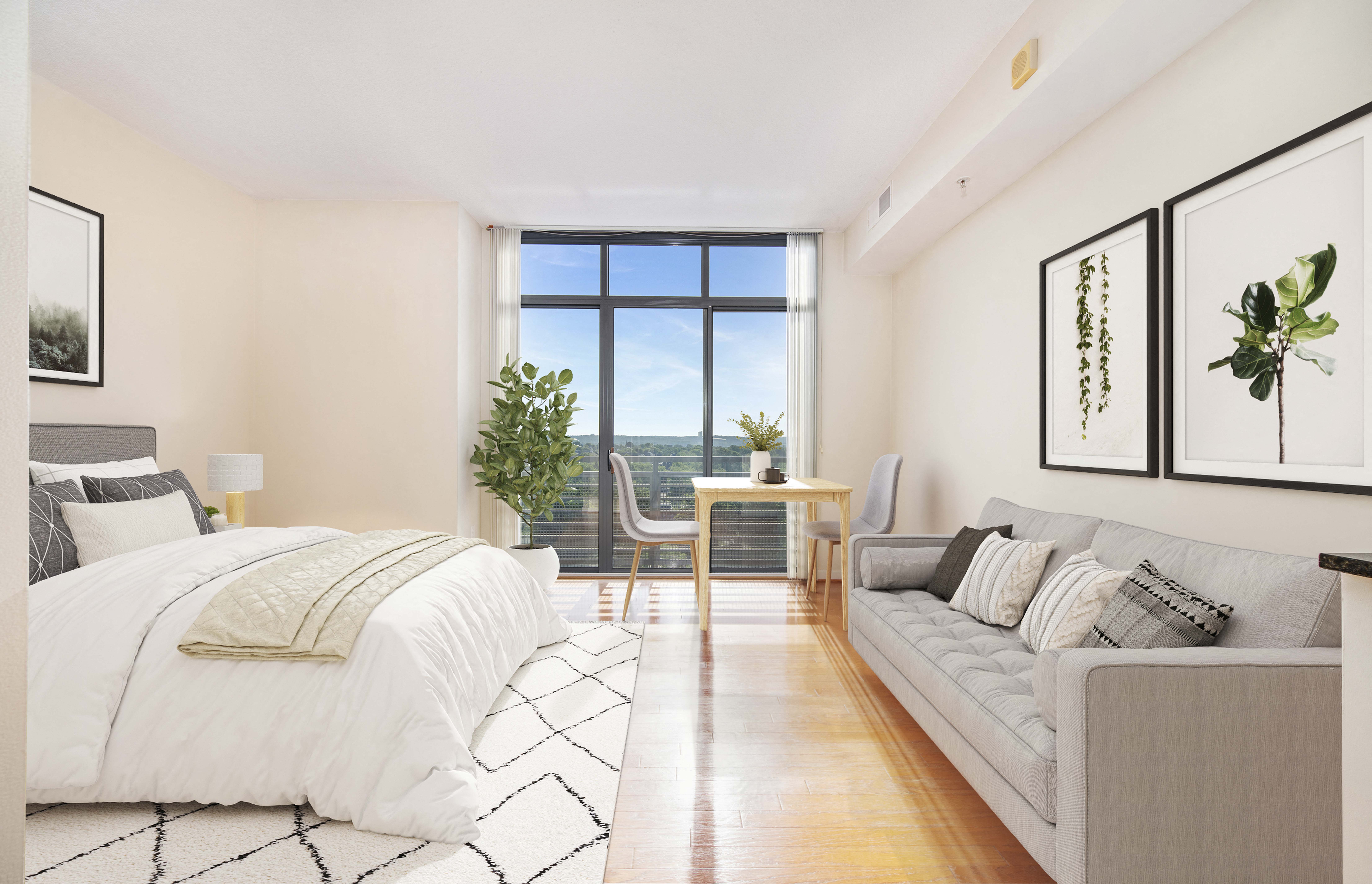 a bedroom with a bed and a couch