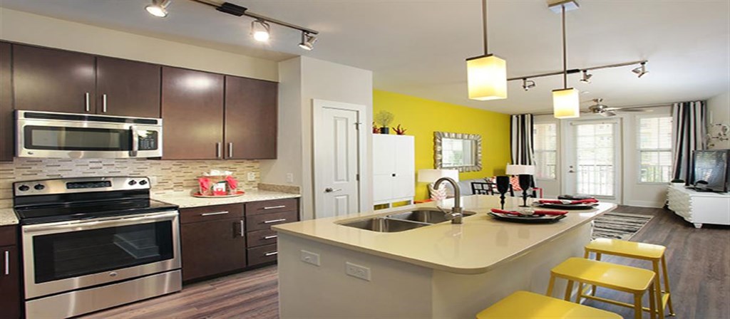 a kitchen with a counter top and a sink