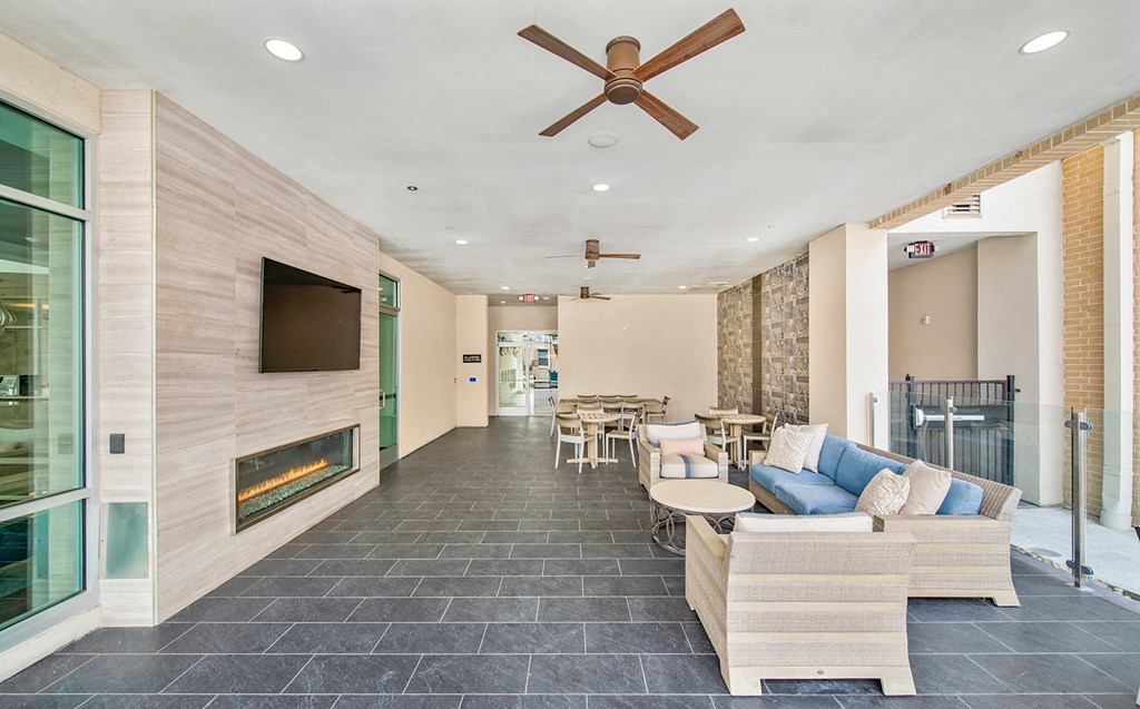 the preserve at ballantyne commons lobby with couches and chairs and a fireplace