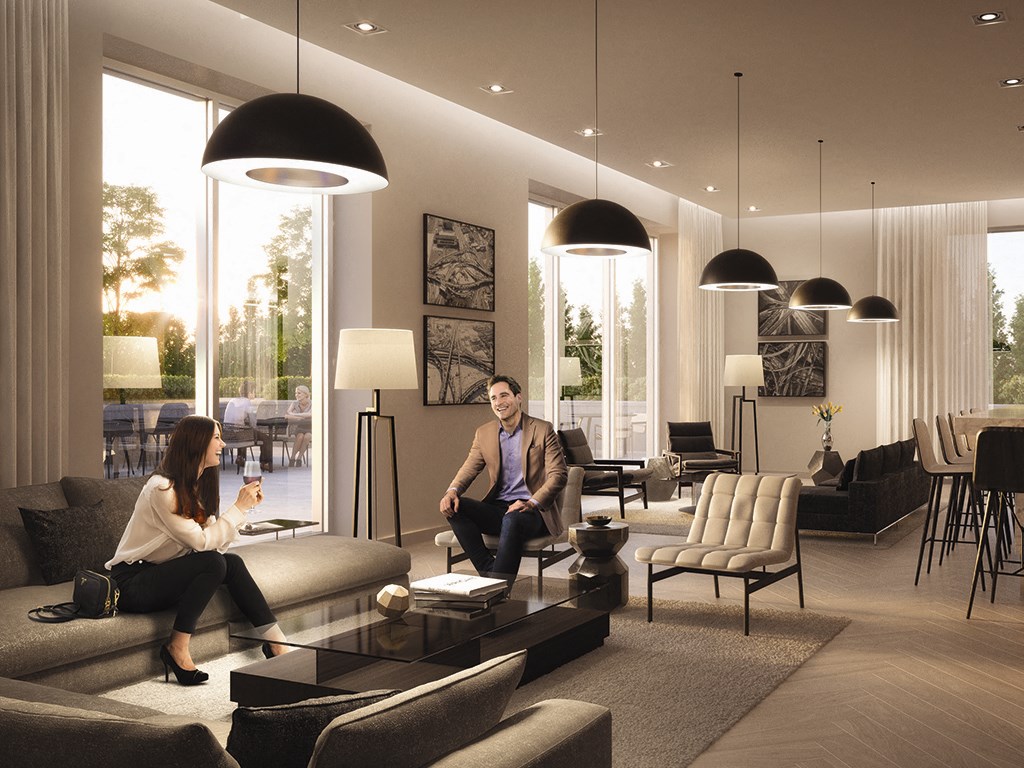 a man and a woman sitting in a living room