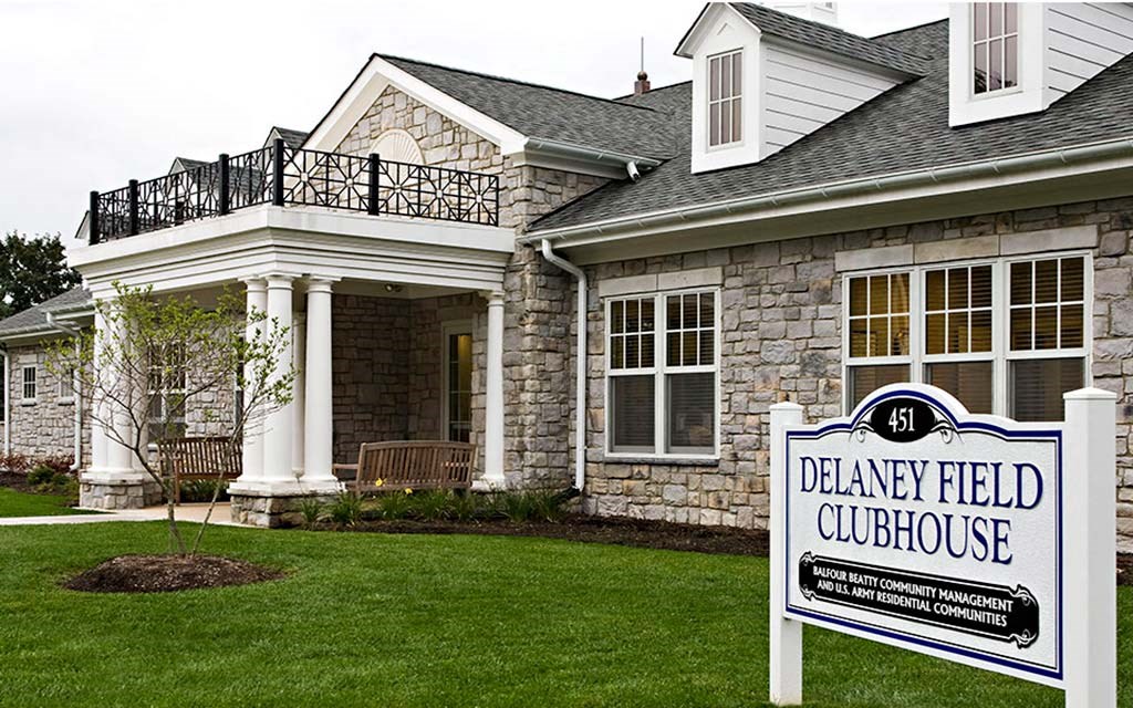 a house with a sign in front of it