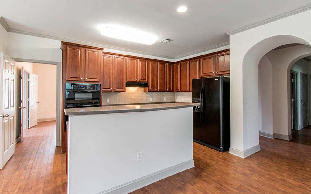 a kitchen with a counter top and