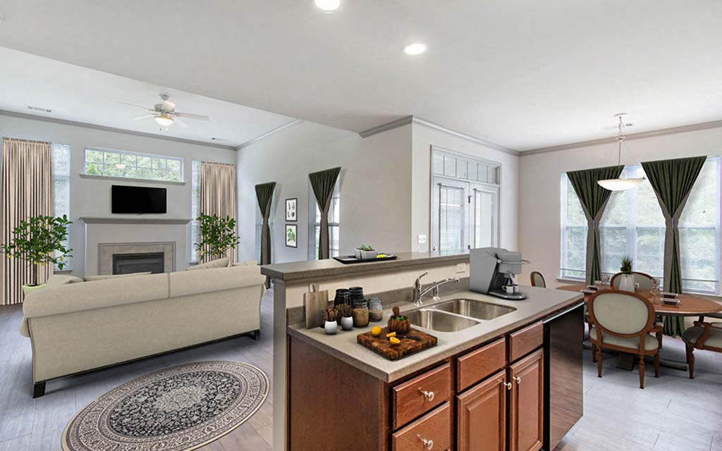 a living room with a kitchen and a couch