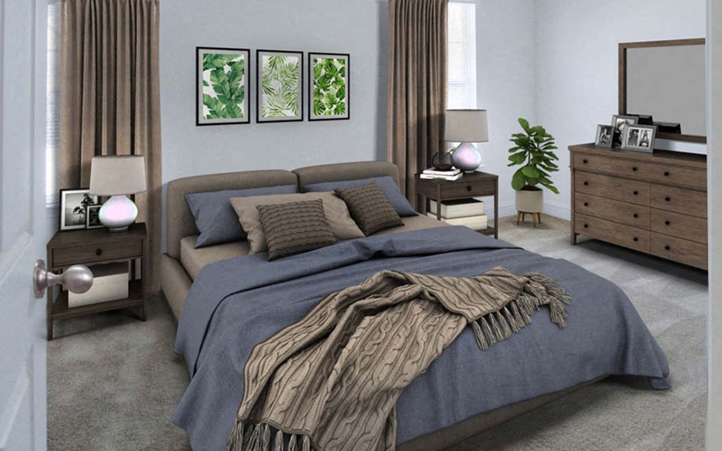 a bedroom with a bed and a dresser