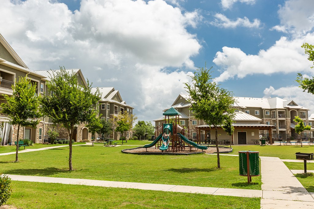 the preserve at ballantyne commons park with playground and houses