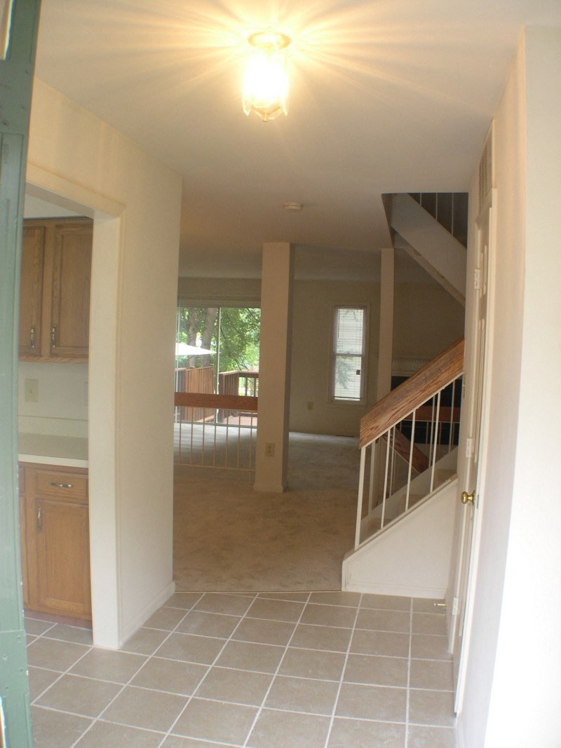 a view of a staircase in a house from the living room