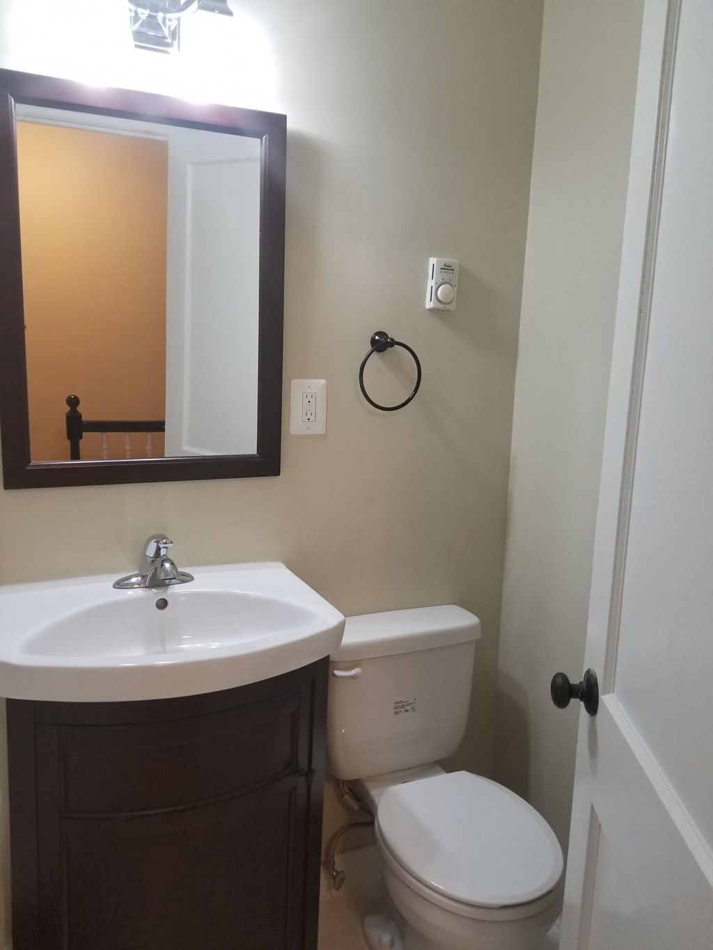 a small bathroom with a toilet and a sink