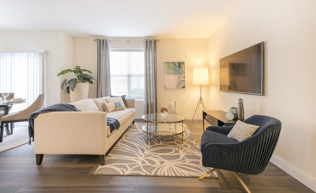 a living room with a couch and a chair