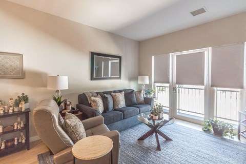 a living room with a couch and a table