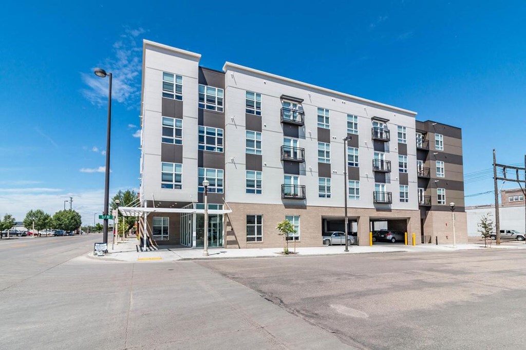 a building with an empty parking lot in front of it