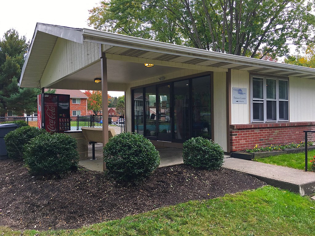 a covered porch in front of a house