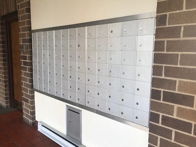 a wall of tiles on a brick wall