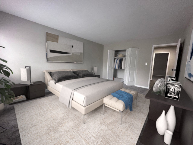 a bedroom with a large white bed and a closet