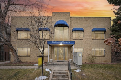 A building with a sign that says South Josephine Apts.