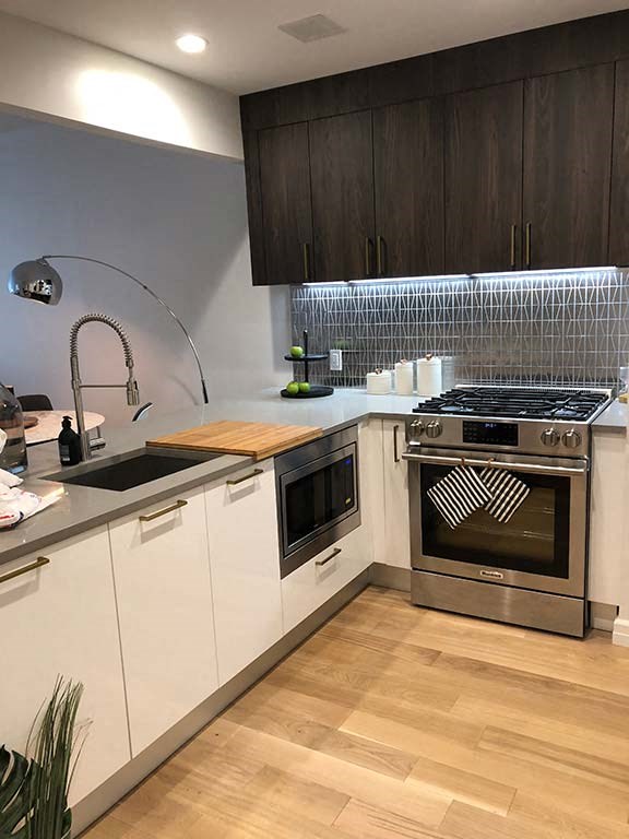 a kitchen with a stove and a sink
