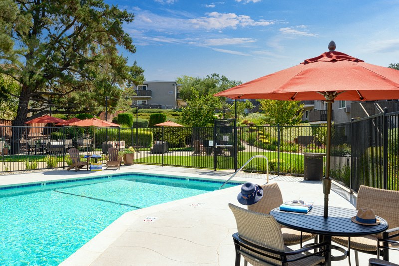 Pool-side patio at Pleasanton Heights Apartments