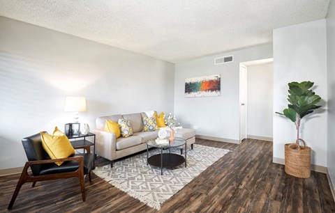 a living room with a couch and a table