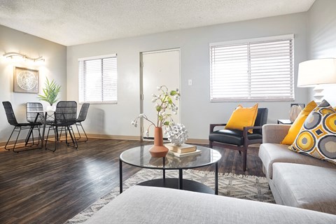 a living room with a couch and a table