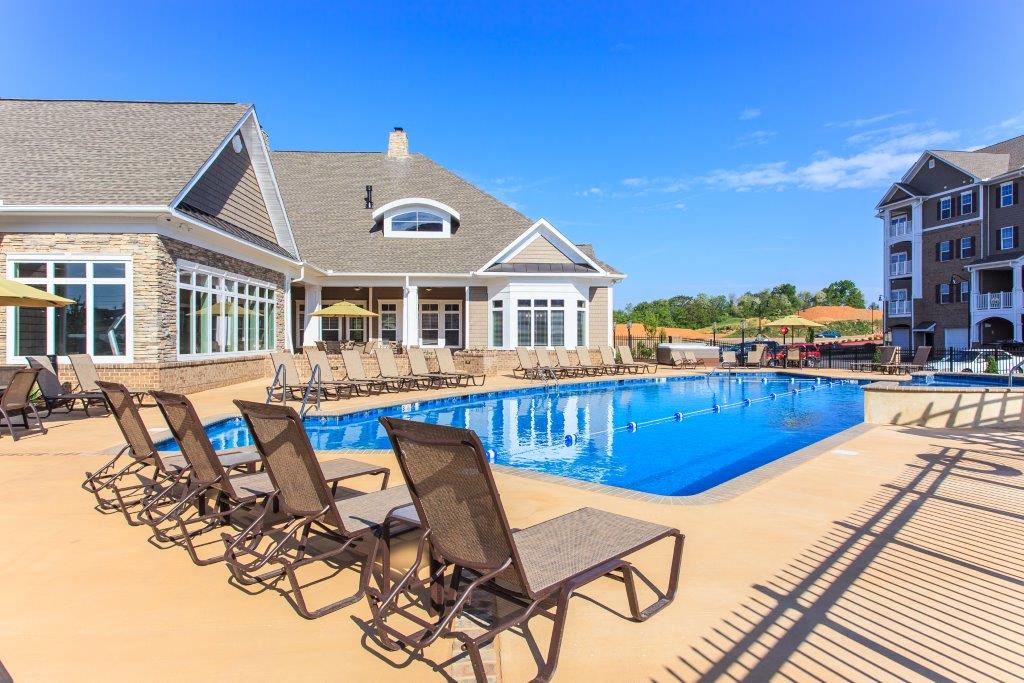 the swimming pool at the resort on a sunny day