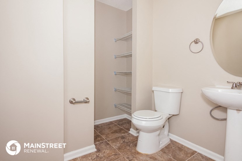 a small bathroom with a toilet and a sink
