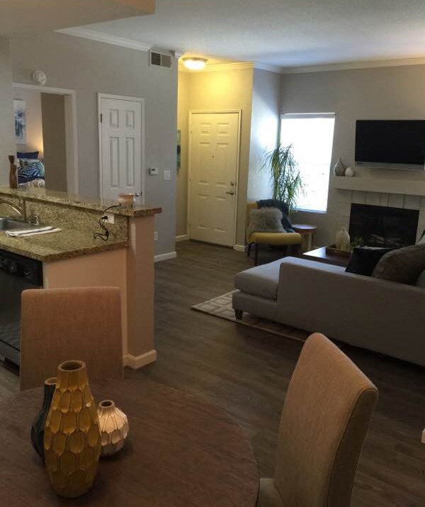 a living room with a couch and a table