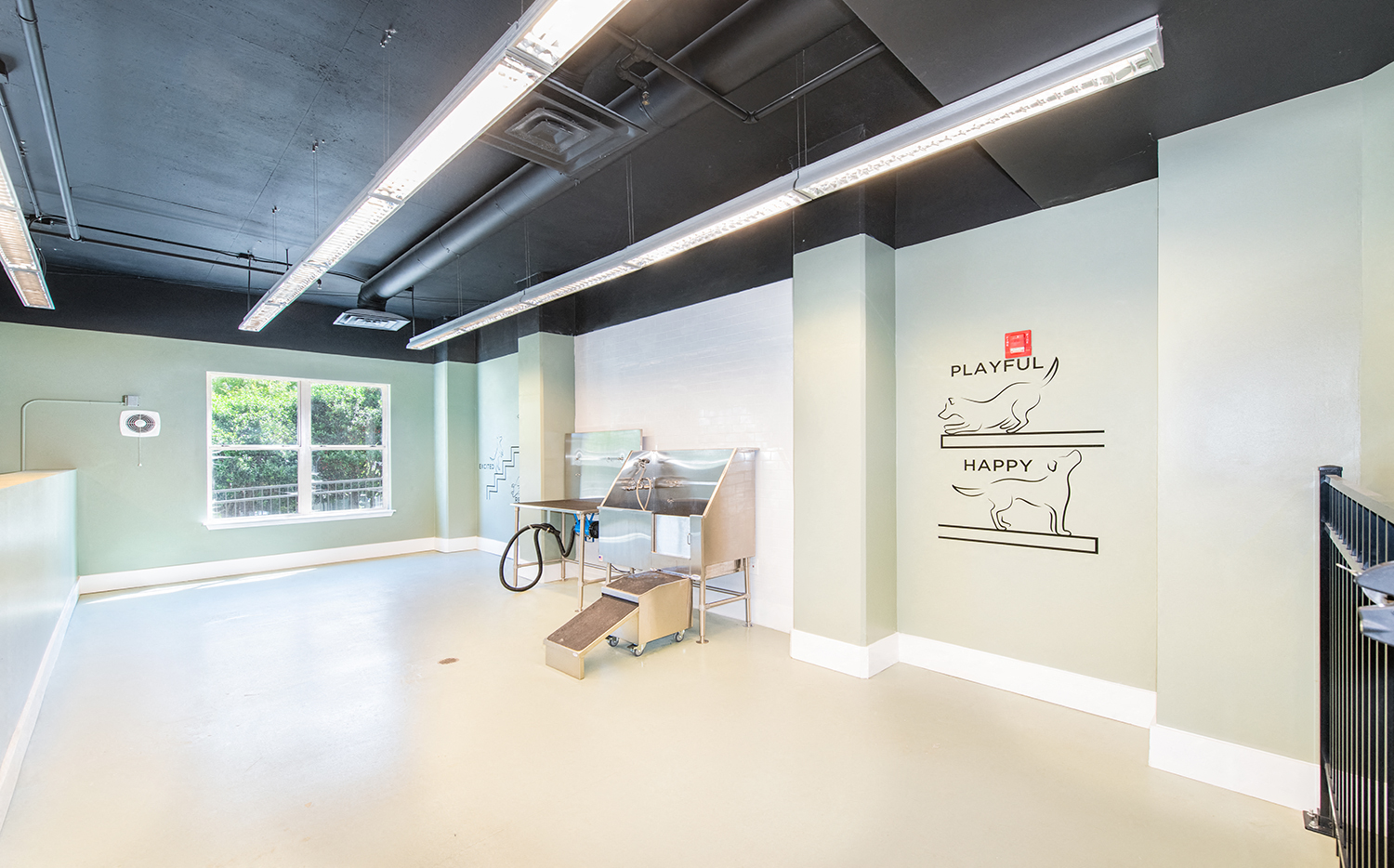 an empty room with a incubator in the middle of it