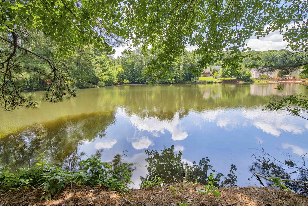 a reflection of the sky in a lake