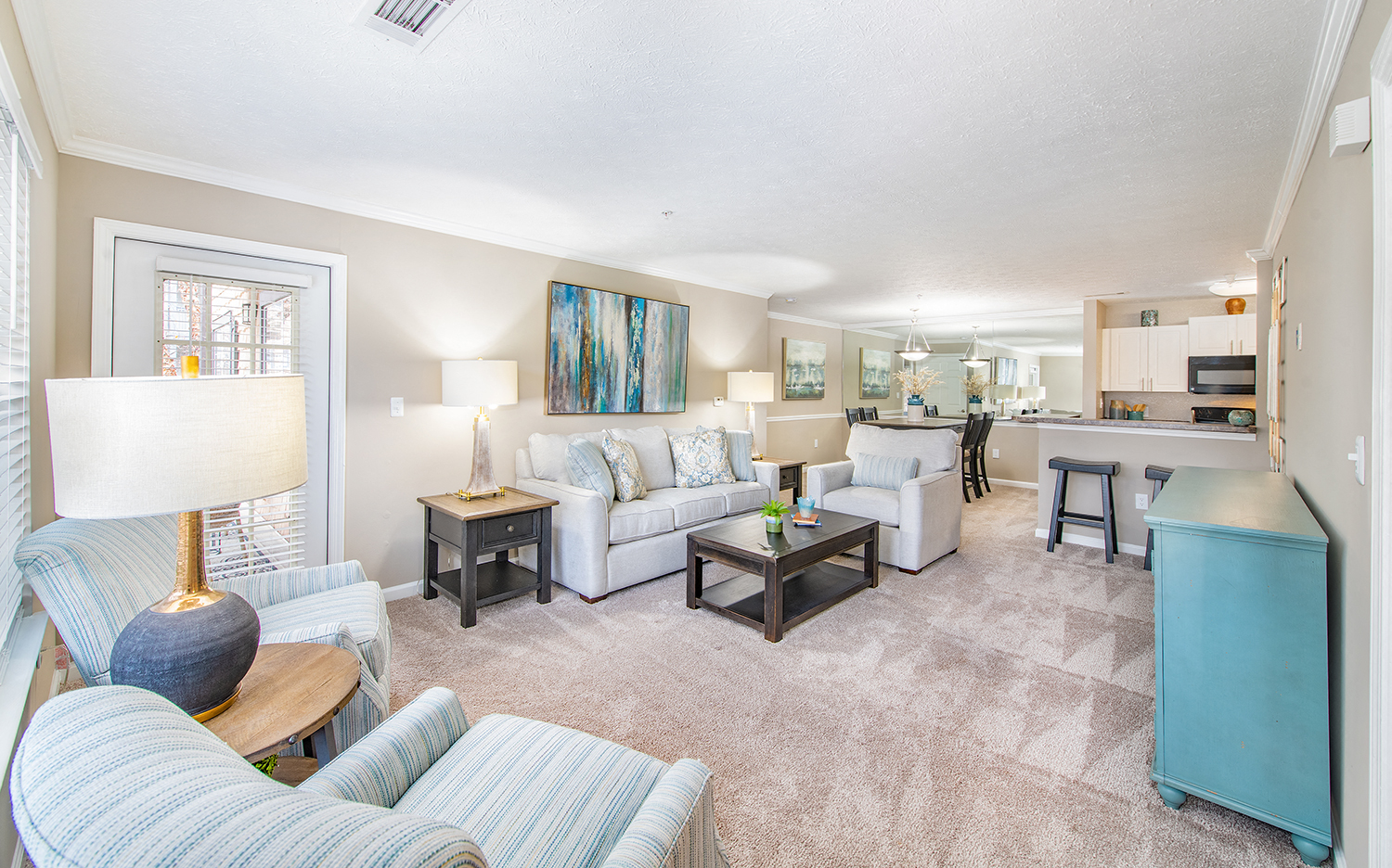 a living room with couches and a table