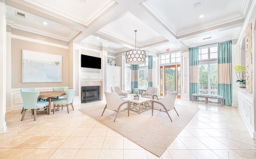 a dining room with a table and chairs and a fireplace