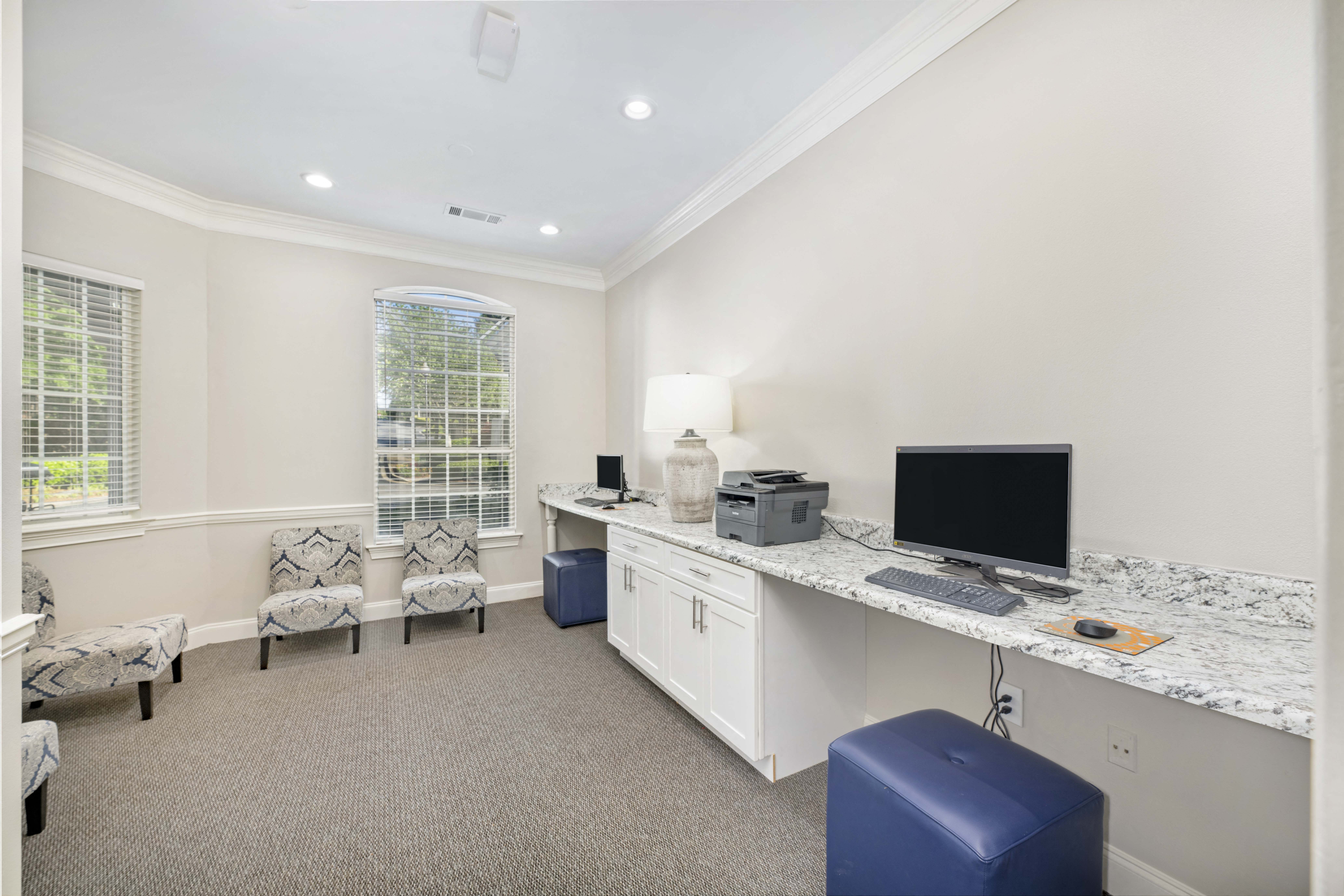 a home office with a desk and a computer