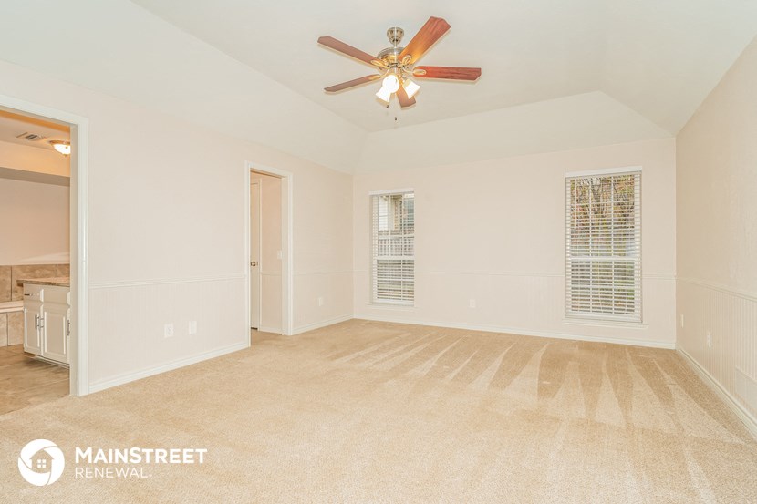 the spacious living room is clean and ready for you to use